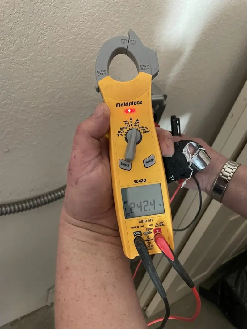 Voltage testing with clamp meter during Aluminum Wiring Replacement in Golden Grove